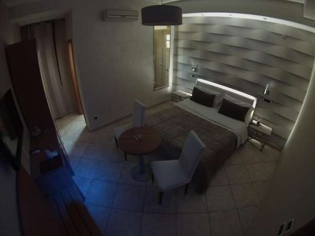 Imagen de la habitación del Hotel Il Giardino degli Aranci. Foto 15