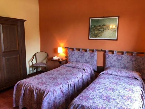 Imagen de la habitación del Hotel Il Granaio. Foto 16