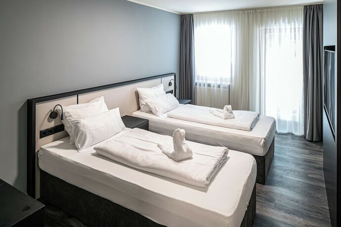 Imagen de la habitación del Hotel Innsento - Health Campus Passau. Foto 16