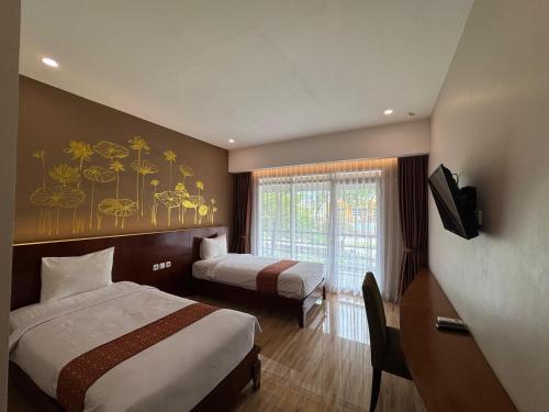 Imagen de la habitación del Hotel Insitu Garut Syariah. Foto 12