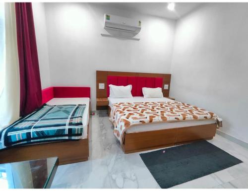 Imagen de la habitación del Hotel Jahnavi , Uttarkashi. Foto 10