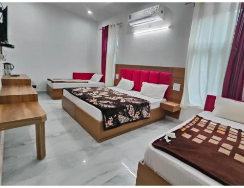 Imagen de la habitación del Hotel Jahnavi , Uttarkashi. Foto 11