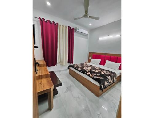 Imagen de la habitación del Hotel Jahnavi , Uttarkashi. Foto 13