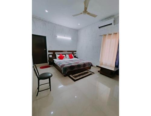 Imagen de la habitación del Hotel Jahnavi , Uttarkashi. Foto 16