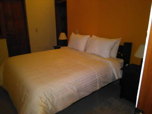 Imagen de la habitación del Hotel Jardines De La Villa. Foto 1