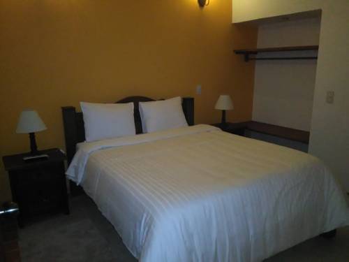 Imagen de la habitación del Hotel Jardines De La Villa. Foto 2