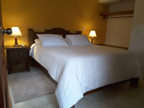 Imagen de la habitación del Hotel Jardines De La Villa. Foto 4