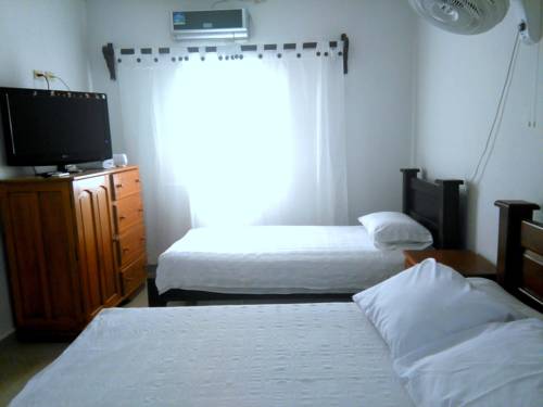 Imagen de la habitación del Hotel Jardines Evans. Foto 2