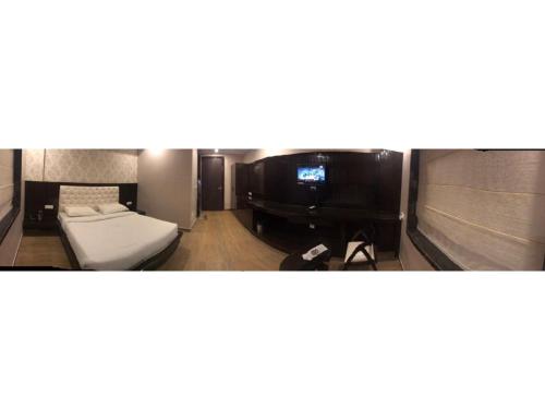 Imagen de la habitación del Hotel Jasmine, Haridwar. Foto 12