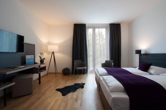 Imagen de la habitación del Hotel K99. Foto 13