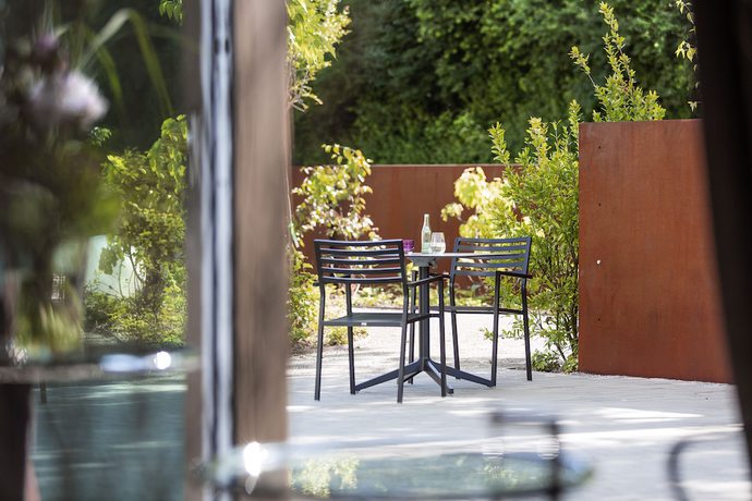 Imagen de la habitación del Hotel K99. Foto 16