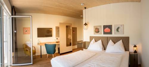 Imagen de la habitación del Hotel Katamaran. Foto 7