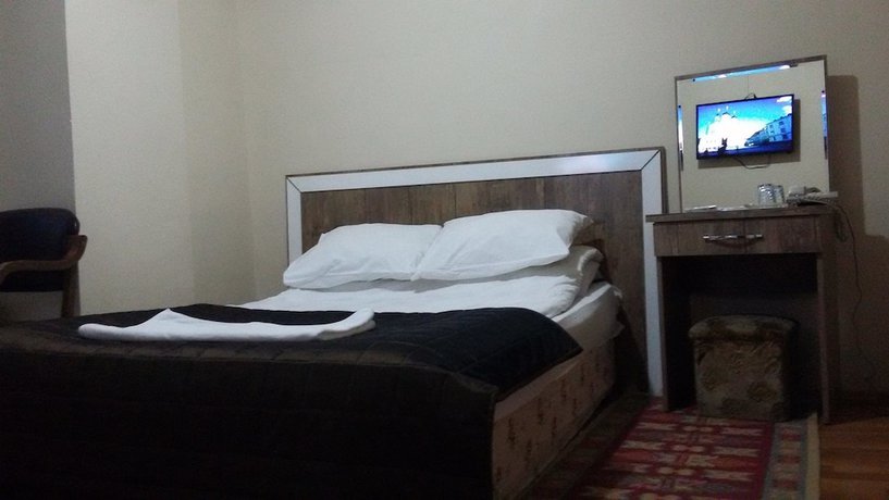 Imagen de la habitación del Hotel Kervansaray. Foto 7