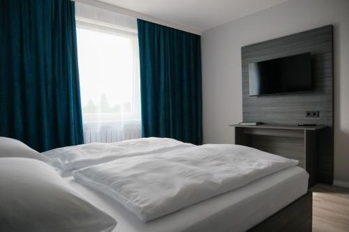 Imagen de la habitación del Hotel Kiel by MELIO. Foto 9