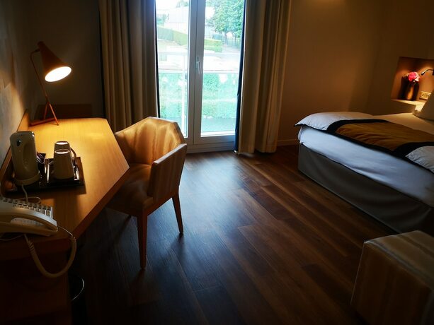 Imagen de la habitación del Hotel Konine - Les Suites. Foto 14