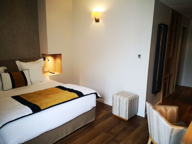 Imagen de la habitación del Hotel Konine - Les Suites. Foto 15
