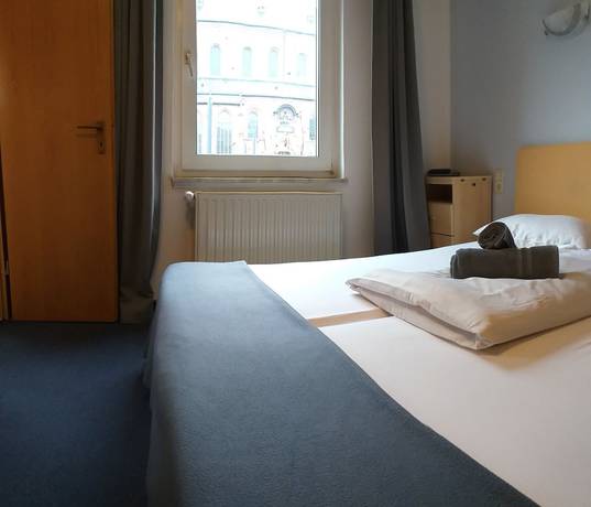 Imagen de la habitación del Hotel Kriemhilde. Foto 14