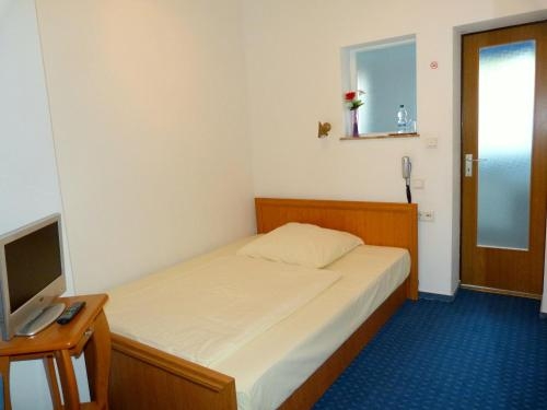 Imagen de la habitación del Hotel Krone, Alsfeld. Foto 6