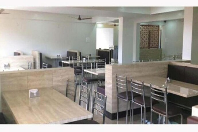 Imagen del bar/restaurante del Hotel Krushna Inn. Foto 4