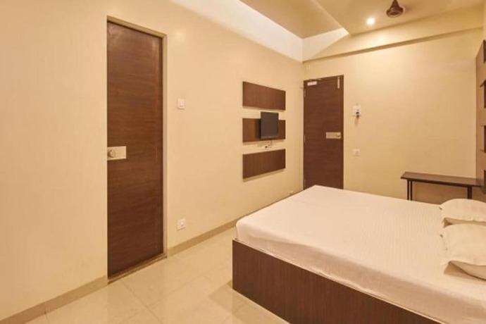 Imagen de la habitación del Hotel Krushna Inn. Foto 5