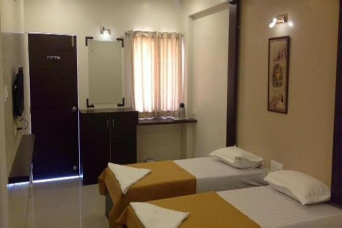 Imagen de la habitación del Hotel Krushna Inn. Foto 6