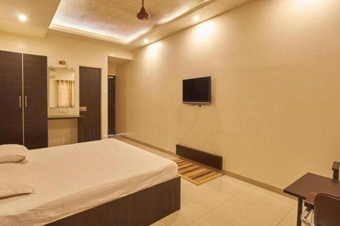 Imagen de la habitación del Hotel Krushna Inn. Foto 15