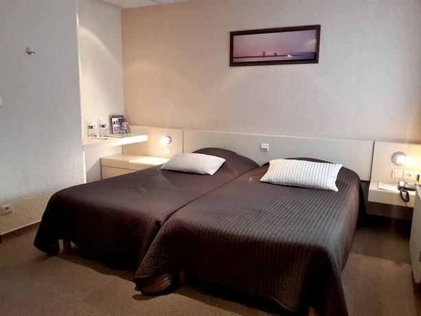 Imagen de la habitación del Hotel L Arcombelle. Foto 14