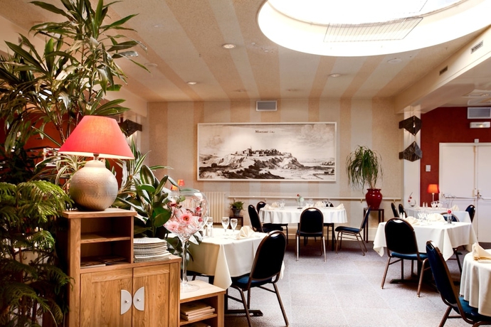 Imagen del bar/restaurante del Hotel L Arcombelle. Foto 7