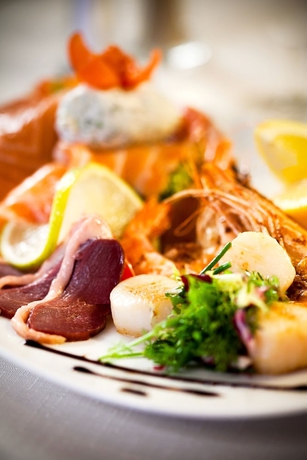 Imagen del bar/restaurante del Hotel L Arcombelle. Foto 11