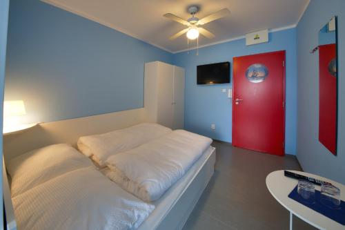 Imagen de la habitación del Hotel LA PORT. Foto 5
