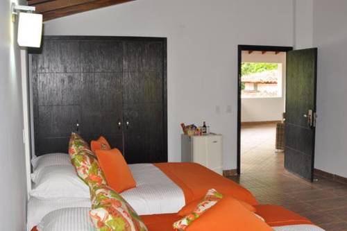 Imagen de la habitación del Hotel La Ardilla De Santa Fe. Foto 2