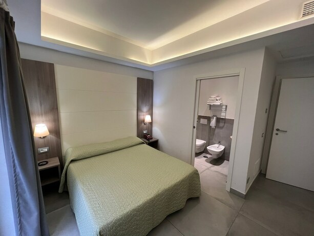 Imagen de la habitación del Hotel La Mela. Foto 20