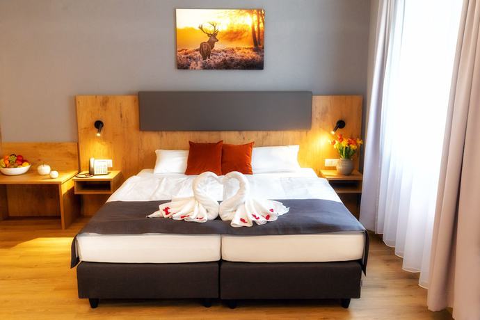 Imagen de la habitación del Hotel La Mirabelle. Foto 16