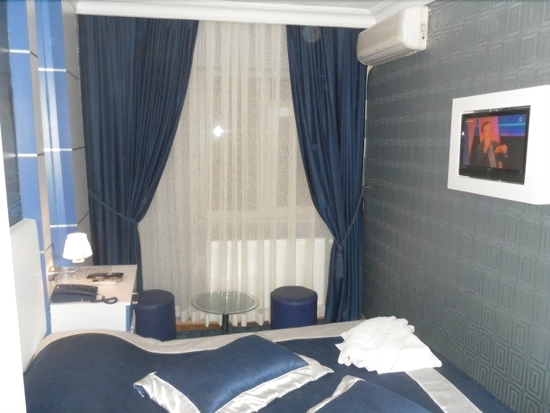 Imagen de la habitación del Hotel La White. Foto 10