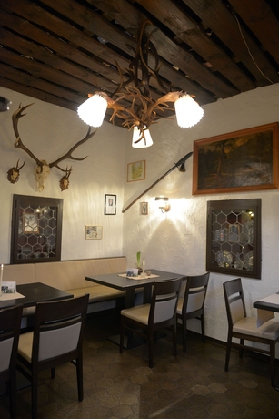 Imagen del bar/restaurante del Hotel- Landgasthof Baumhof-tenne. Foto 4