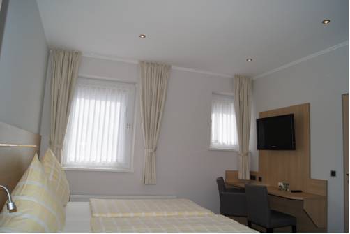 Imagen de la habitación del Hotel Lang. Foto 14