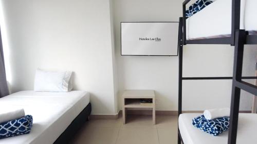 Imagen de la habitación del Hotel Las Olas Bello. Foto 19