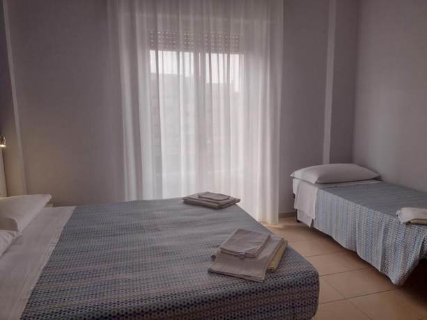 Imagen de la habitación del Hotel Le Ali. Foto 7