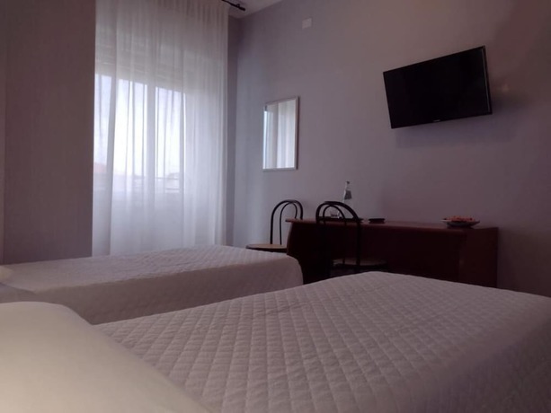 Imagen de la habitación del Hotel Le Ali. Foto 17