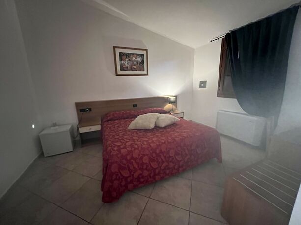 Imagen de la habitación del Hotel Le Corti. Foto 10