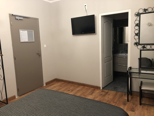 Imagen de la habitación del Hotel Le Lys d\'Or. Foto 6