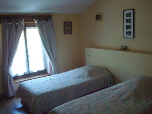Imagen de la habitación del Hotel Le Mas de Rivet. Foto 5