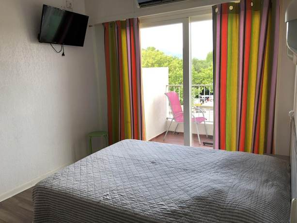 Imagen de la habitación del Hotel Le Pescadou. Foto 4