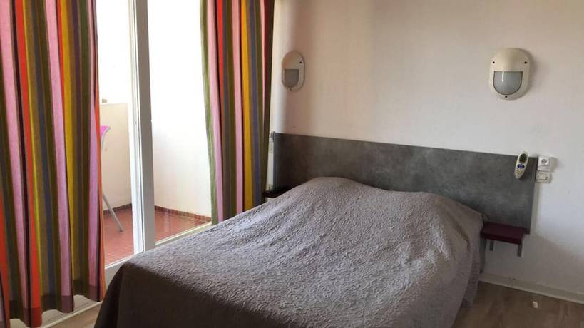 Imagen de la habitación del Hotel Le Pescadou. Foto 11