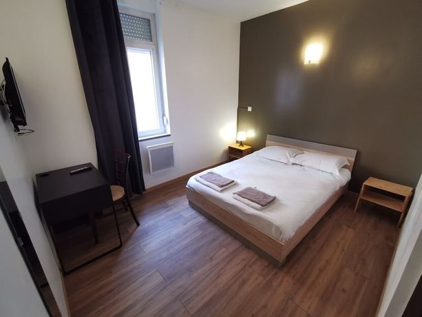 Imagen de la habitación del Hotel Le Saint Quentin. Foto 14