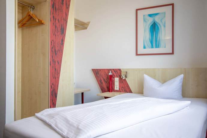 Imagen de la habitación del Hotel Le Village. Foto 6