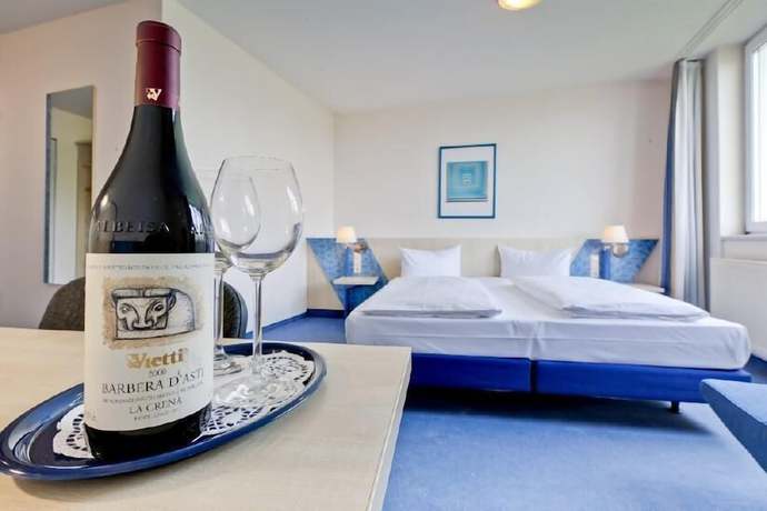 Imagen de la habitación del Hotel Le Village. Foto 7