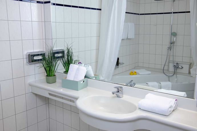 Imagen de la habitación del Hotel Le Village. Foto 11