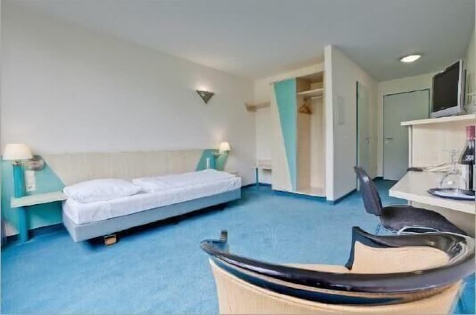 Imagen de la habitación del Hotel Le Village. Foto 12