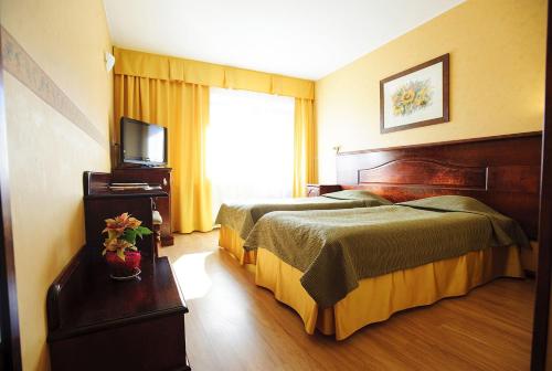 Imagen de la habitación del Hotel Legend. Foto 7